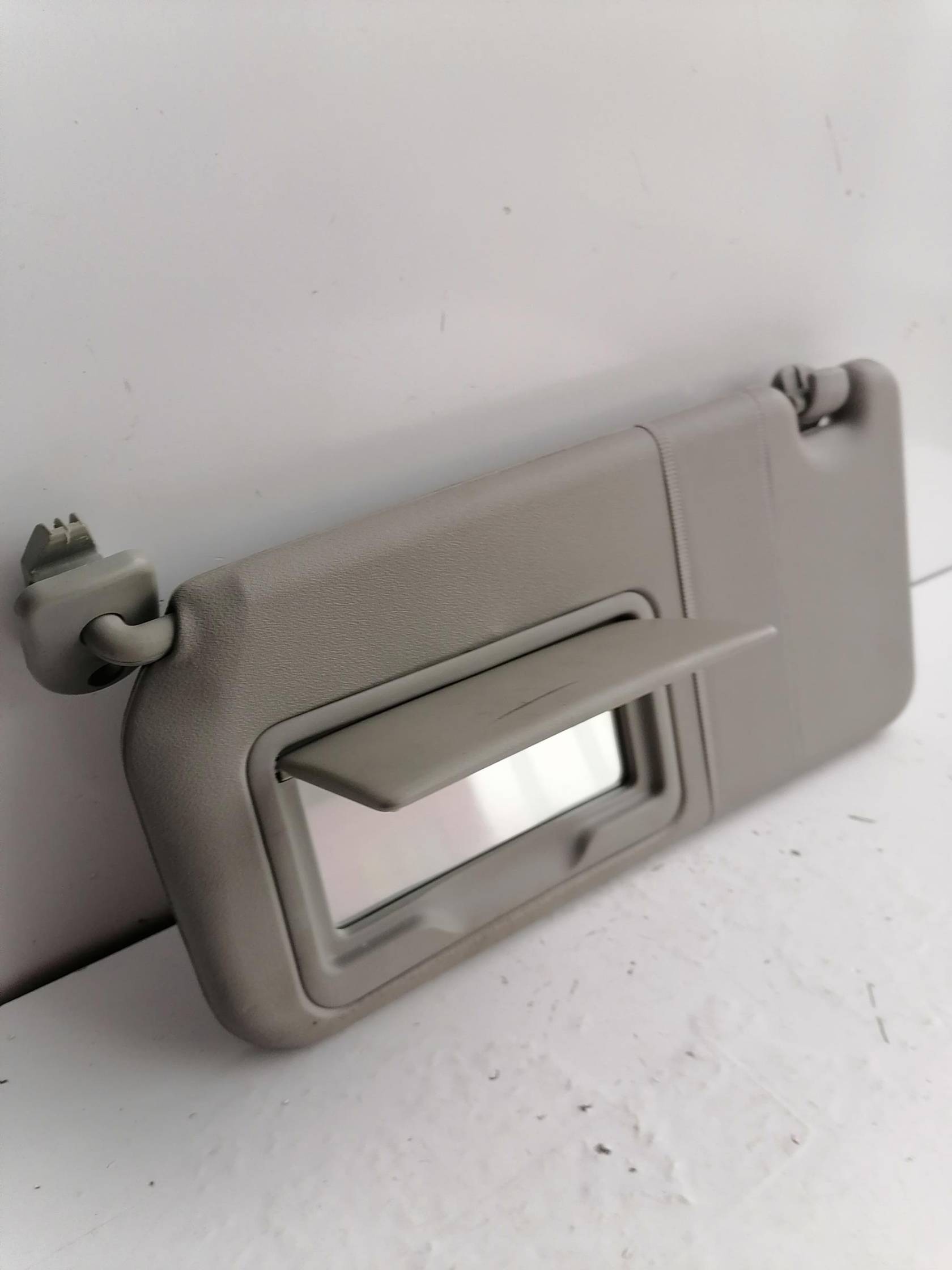 Aletta parasole parabrezza sx.